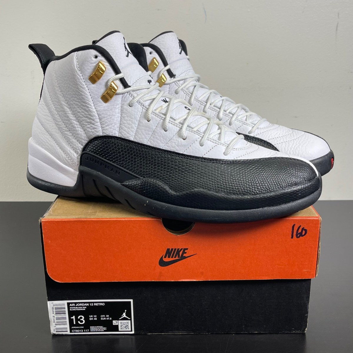 Jordan 12 Retro Taxi (2025) 13 (Moderately Worn Pre-Owned)JordanWhite/Black/Taxi - Image 1