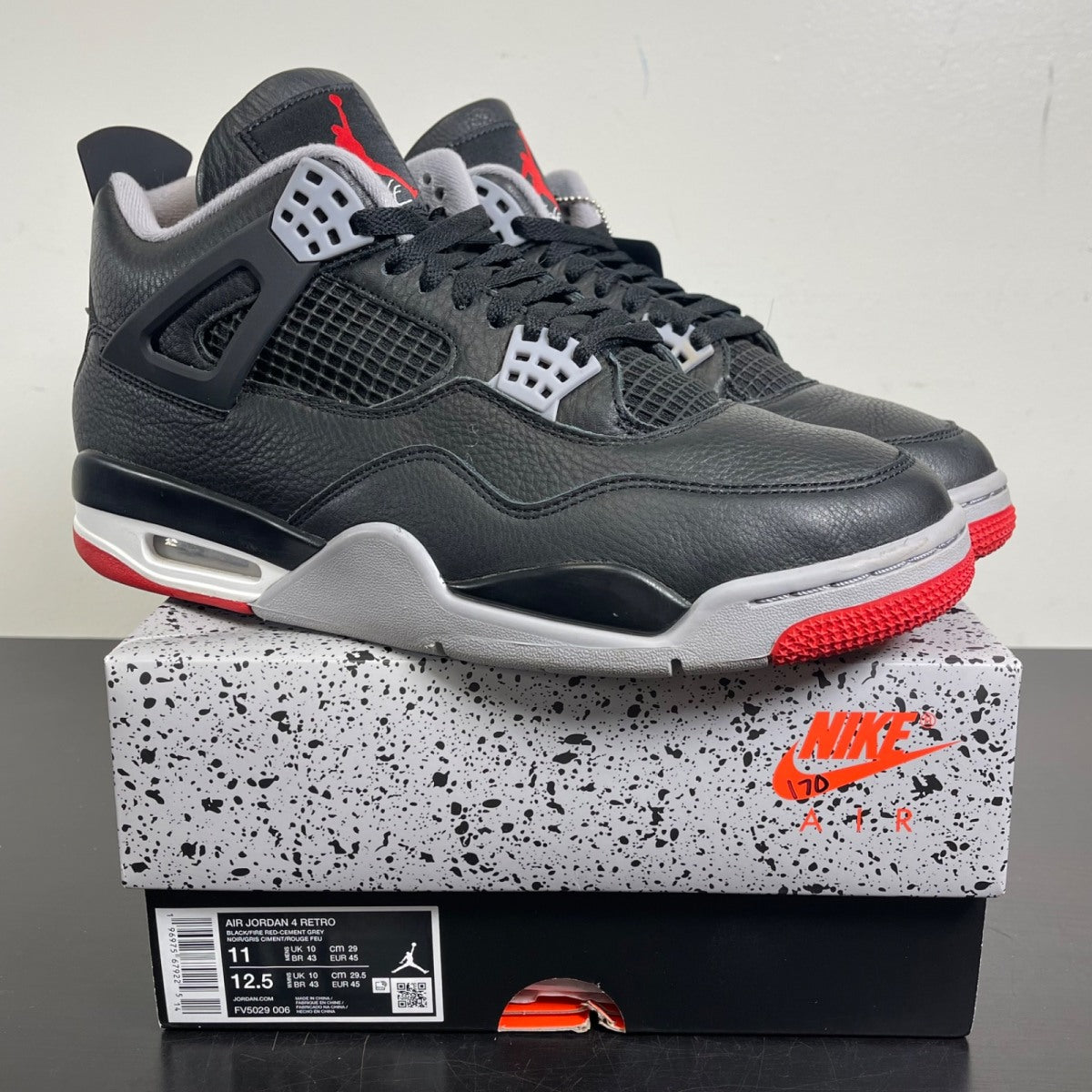 Jordan 4 Retro Bred Reimagined 11 (Moderately Worn Pre-Owned)JordanBlack/Cement Grey/Varsity Red/Summit White - Image 1