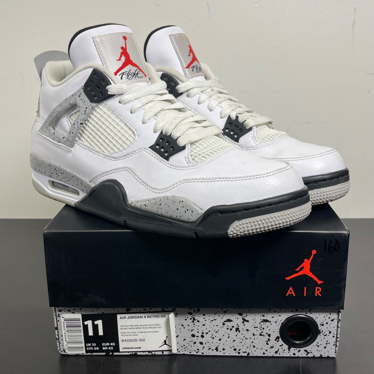 Jordan 4 Retro White Cement (2016) 11 (Moderately Worn Pre-Owned)JordanWhite/Fire Red-Black-Tech Grey - Image 1