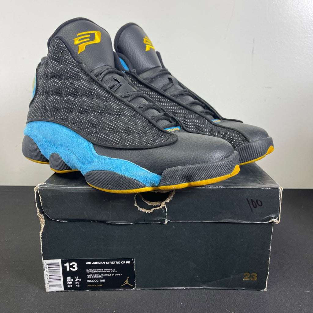 Jordan 13 Retro Chris Paul Away 13 (Moderately Worn Pre-Owned)JordanBlack/Sunstone-Orion Blue - Image 1