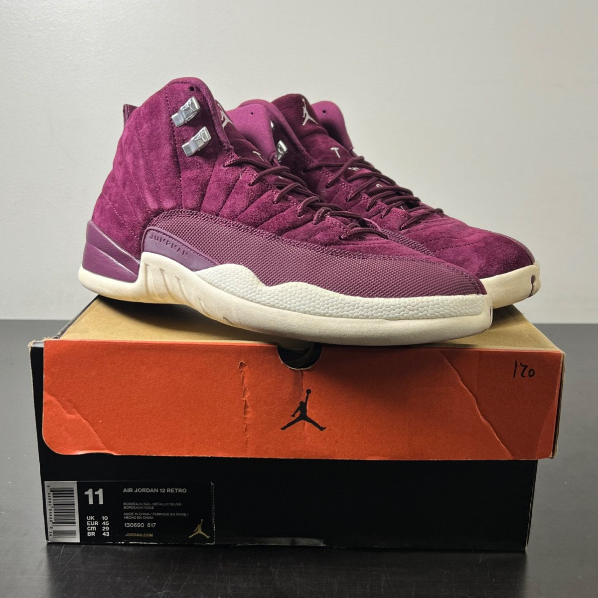 Jordan 12 Retro Bordeaux 11 (Lightly Worn Pre-Owned)JordanBordeaux/Sail-Metallic Silver - Image 1