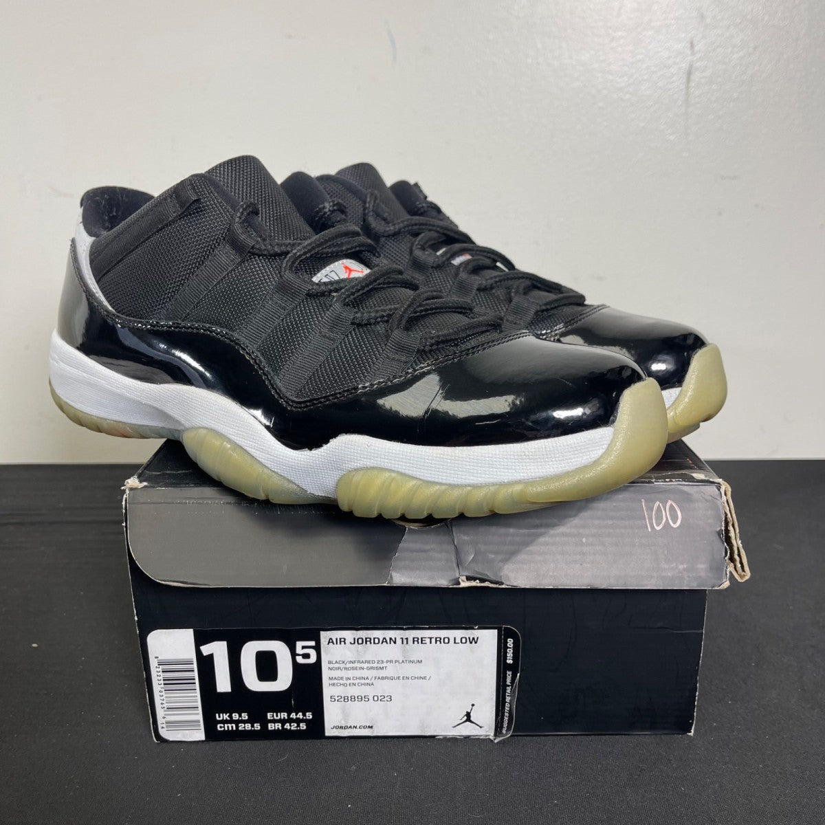 Jordan 11 Retro Low Infrared 10.5 (Moderately Worn Pre-Owned)JordanBlack/Infrared 23-Pure Platinum - Image 1