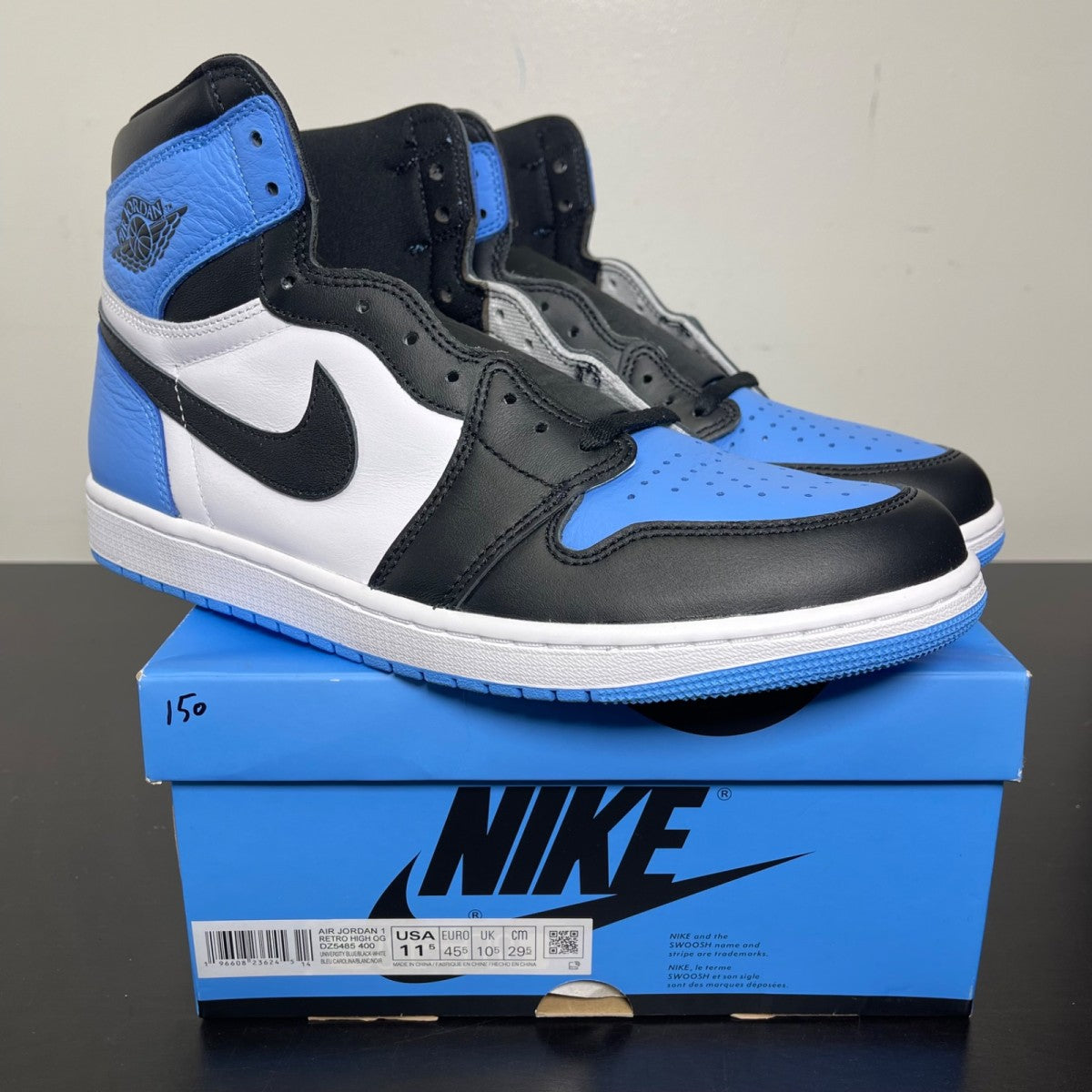 Jordan 1 Retro High OG UNC Toe 11.5 (New Pre-Owned)JordanUniversity Blue/Black/White - Image 1