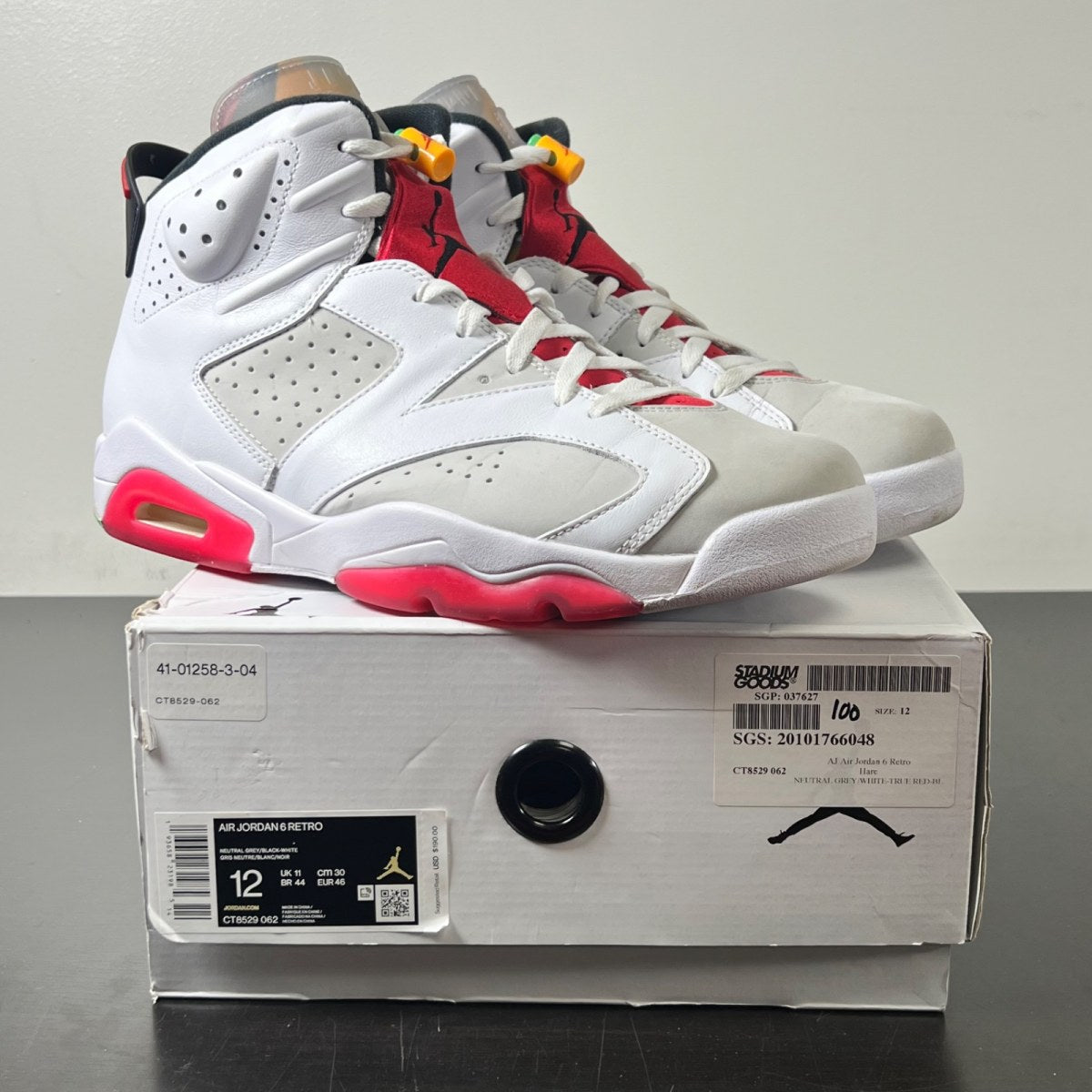 Jordan 6 Retro Hare 12 (Moderately Worn Pre-Owned)JordanNeutral Grey/White-True Red-Black - Image 1