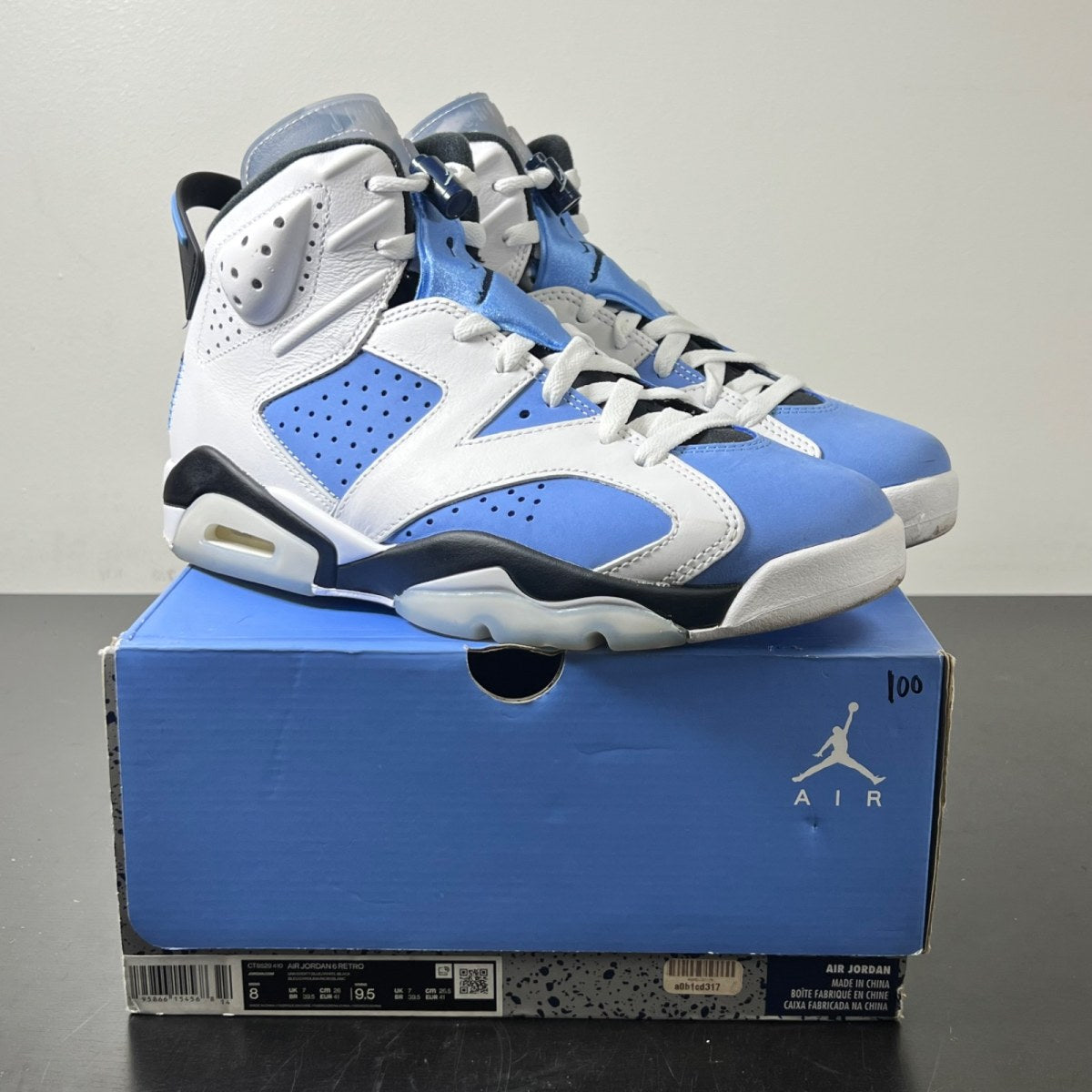 Jordan 6 Retro UNC White 8 (Lightly Worn Pre-Owned)JordanUniversity Blue/White/College Navy/Black - Image 1