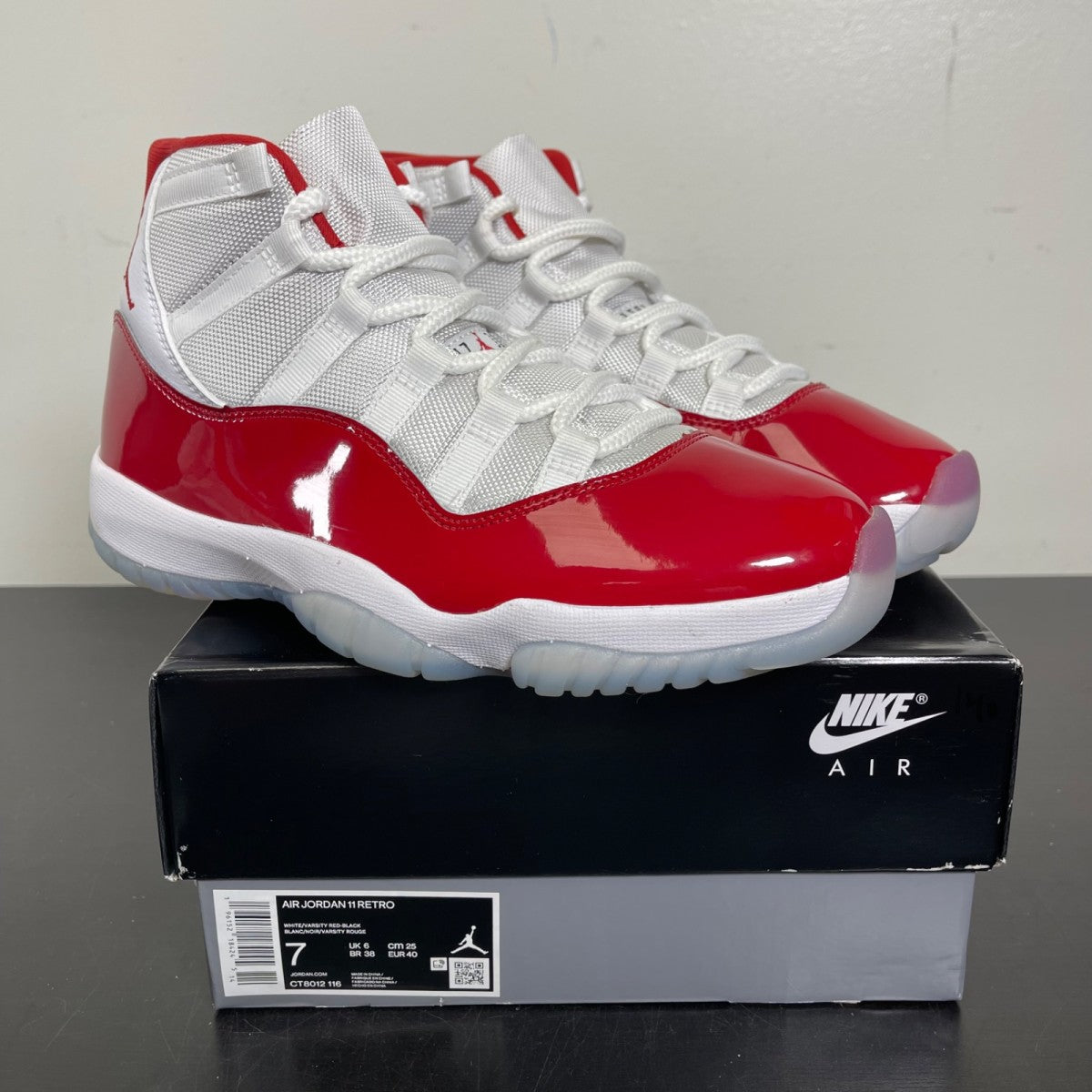 Jordan 11 Retro Cherry (2022) 7 (Moderately Worn Pre-Owned)JordanWhite/Varsity Red/Black - Image 1