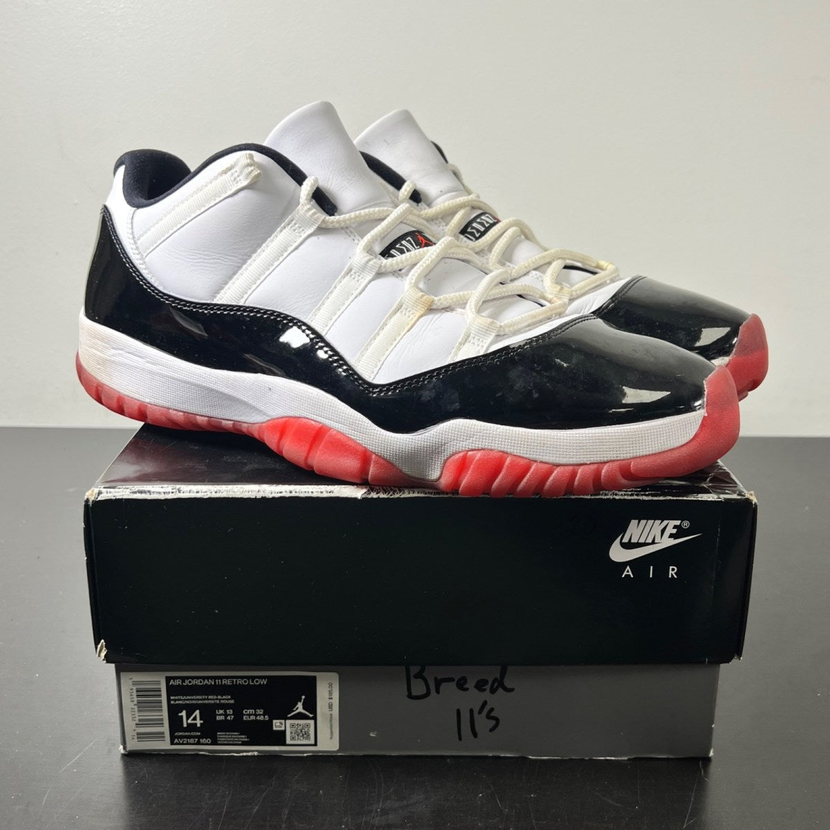 Jordan 11 Retro Low Concord Bred 14 (Moderately Worn Pre-Owned)JordanWhite/Gym Red-Black-True Red - Image 1