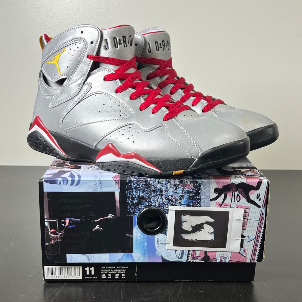 Jordan 7 Retro Reflections of a Champion 11 (Lightly Worn Pre-Owned)JordanReflect Silver/Bronze-Cardinal Red-Black - Image 1