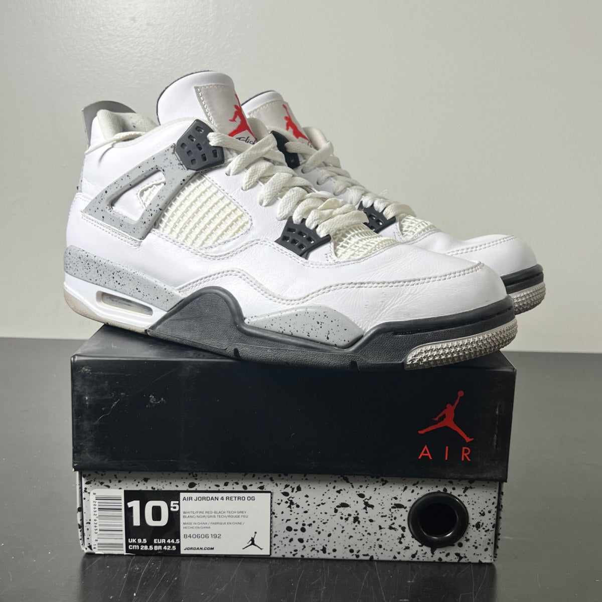Jordan 4 Retro White Cement (2016) 10.5 (Moderately Worn Pre-Owned)JordanWhite/Fire Red-Black-Tech Grey - Image 1