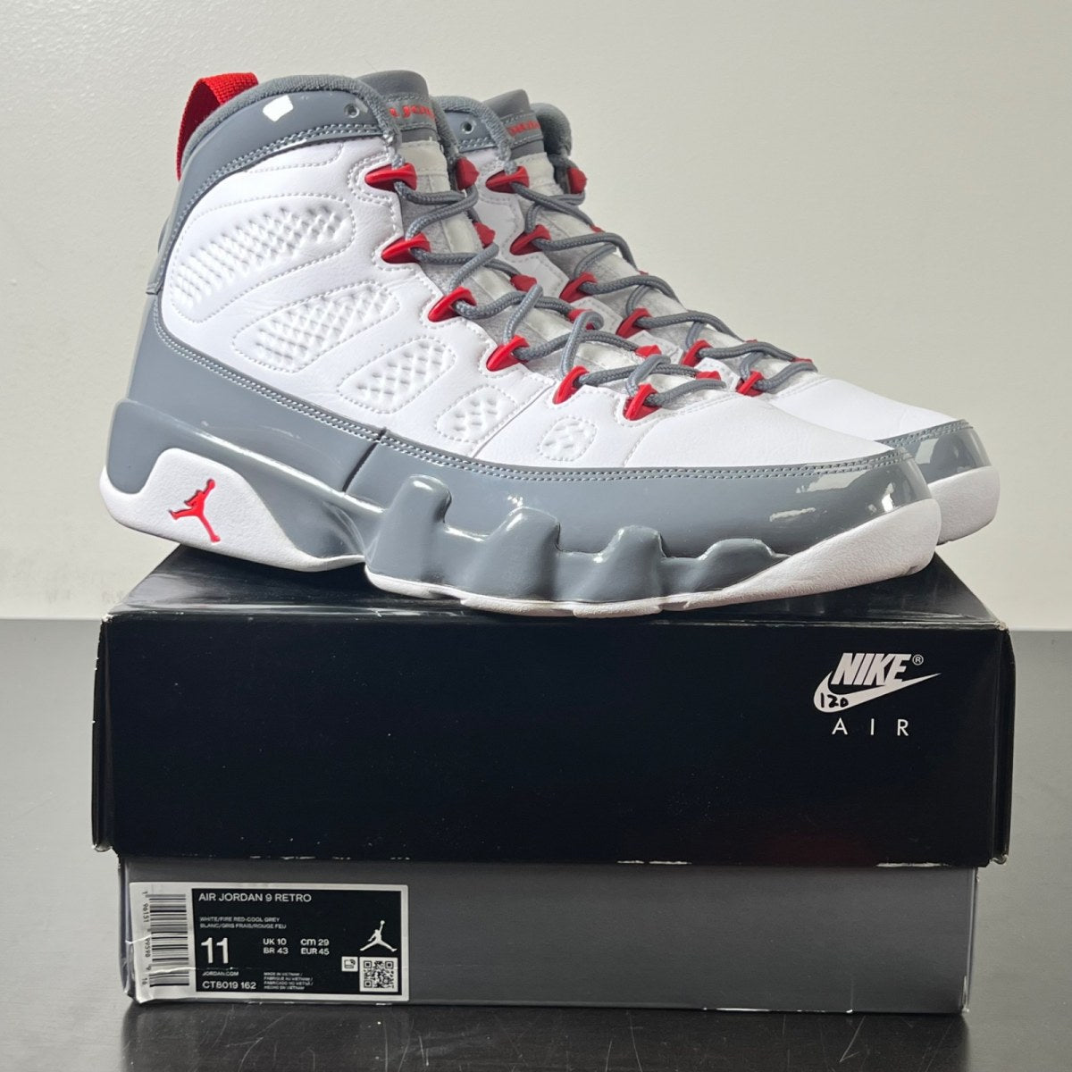 Jordan 9 Retro Fire Red 11 (Lightly Worn Pre-Owned)JordanWhite/Fire Red/Cool Grey - Image 1