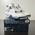 Jordan 4 Retro Midnight Navy 9.5 (Moderately Worn Pre-Owned)JordanWhite/Midnight Navy/Light Smoke Grey-Fire Red - Image 1