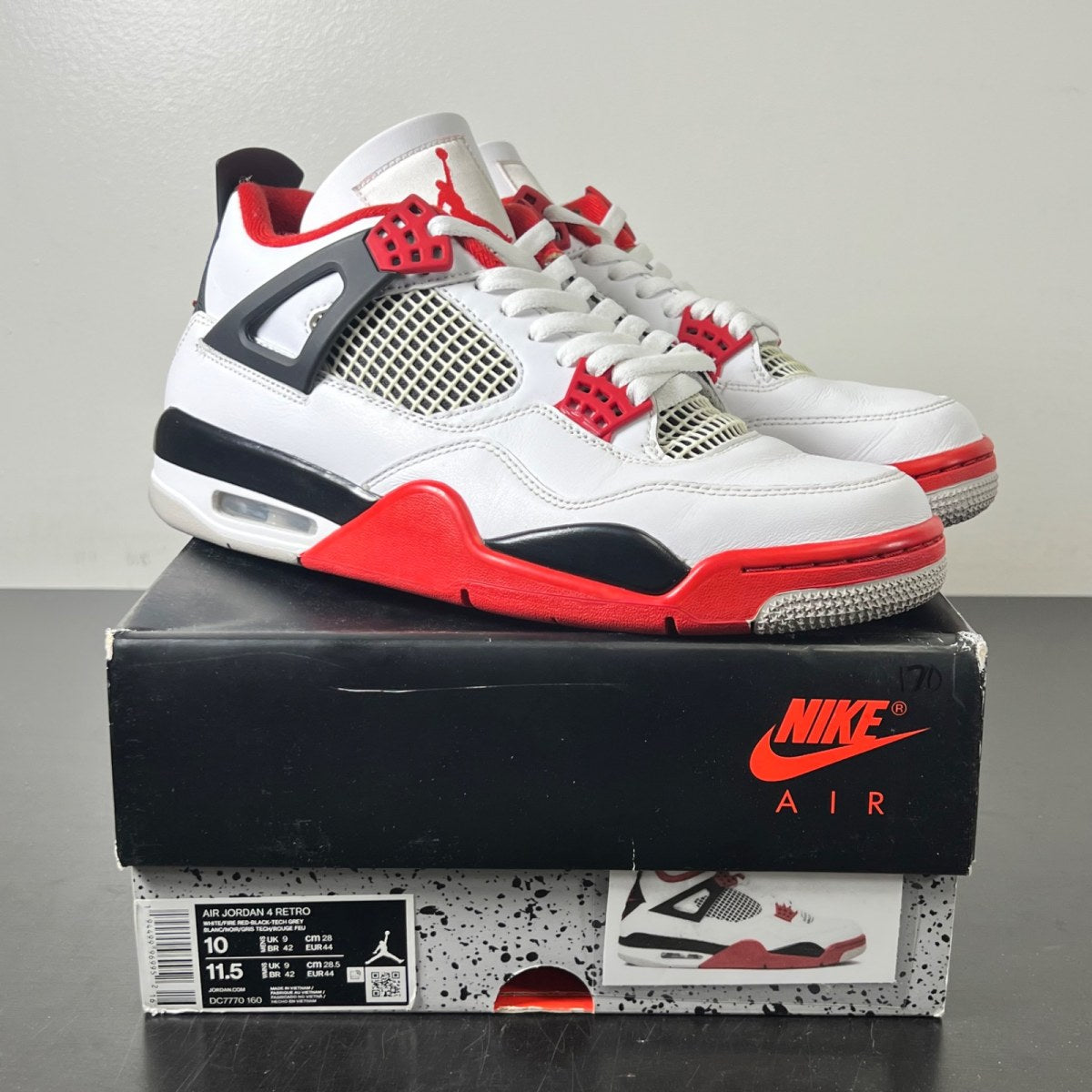 Jordan 4 Retro Fire Red (2020) 10 (Moderately Worn Pre-Owned)JordanWhite/Black-Tech Grey-Fire Red - Image 1