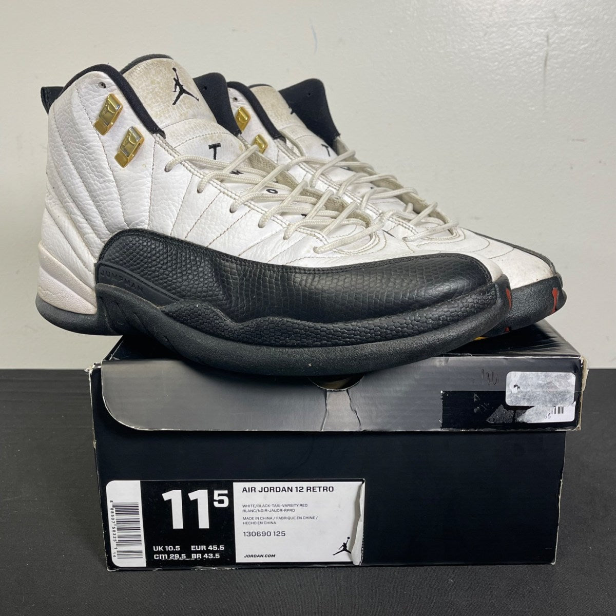 Jordan 12 Retro Taxi (2013) 11.5 (Moderately Worn Pre-Owned)JordanWhite/Black-Taxi - Image 1
