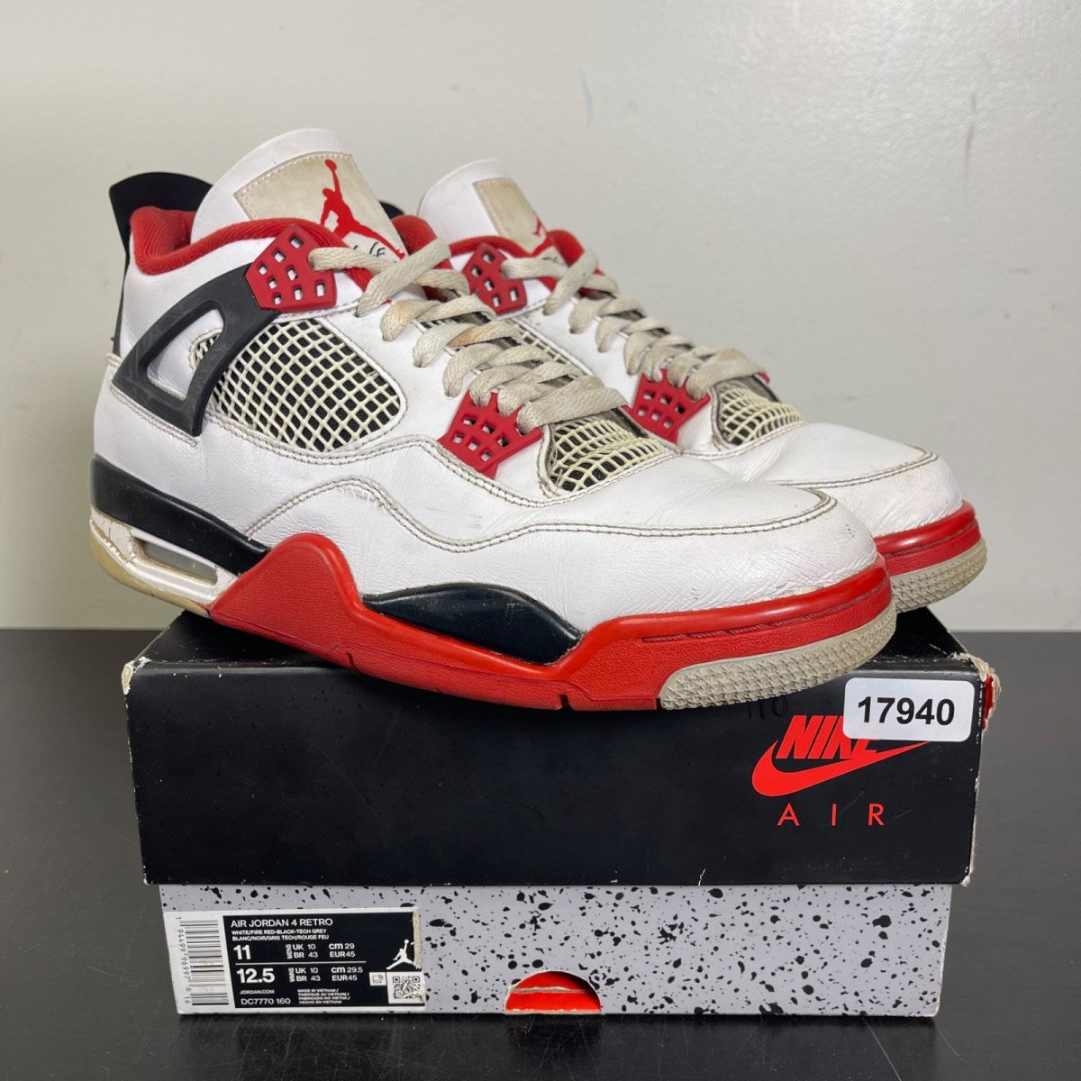 Jordan 4 Retro Fire Red (2020) 11 (Moderately Worn Pre-Owned)JordanWhite/Black-Tech Grey-Fire Red - Image 1
