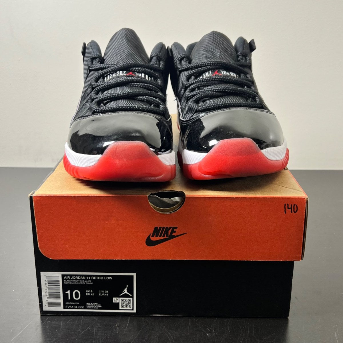 Jordan 11 Retro Low Bred (2025) 10 (Lightly Worn Pre-Owned)JordanBlack/White-Varsity Red - Image 2