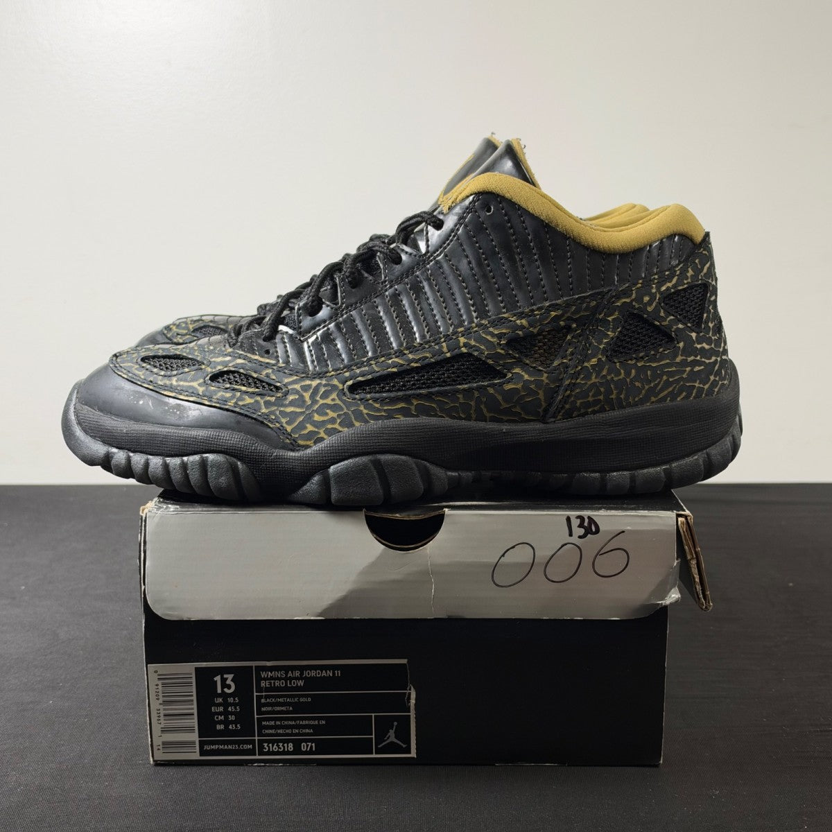 Jordan 11 Retro Low IE Black Metallic Gold (Women's) (Size 13W) - Image 3