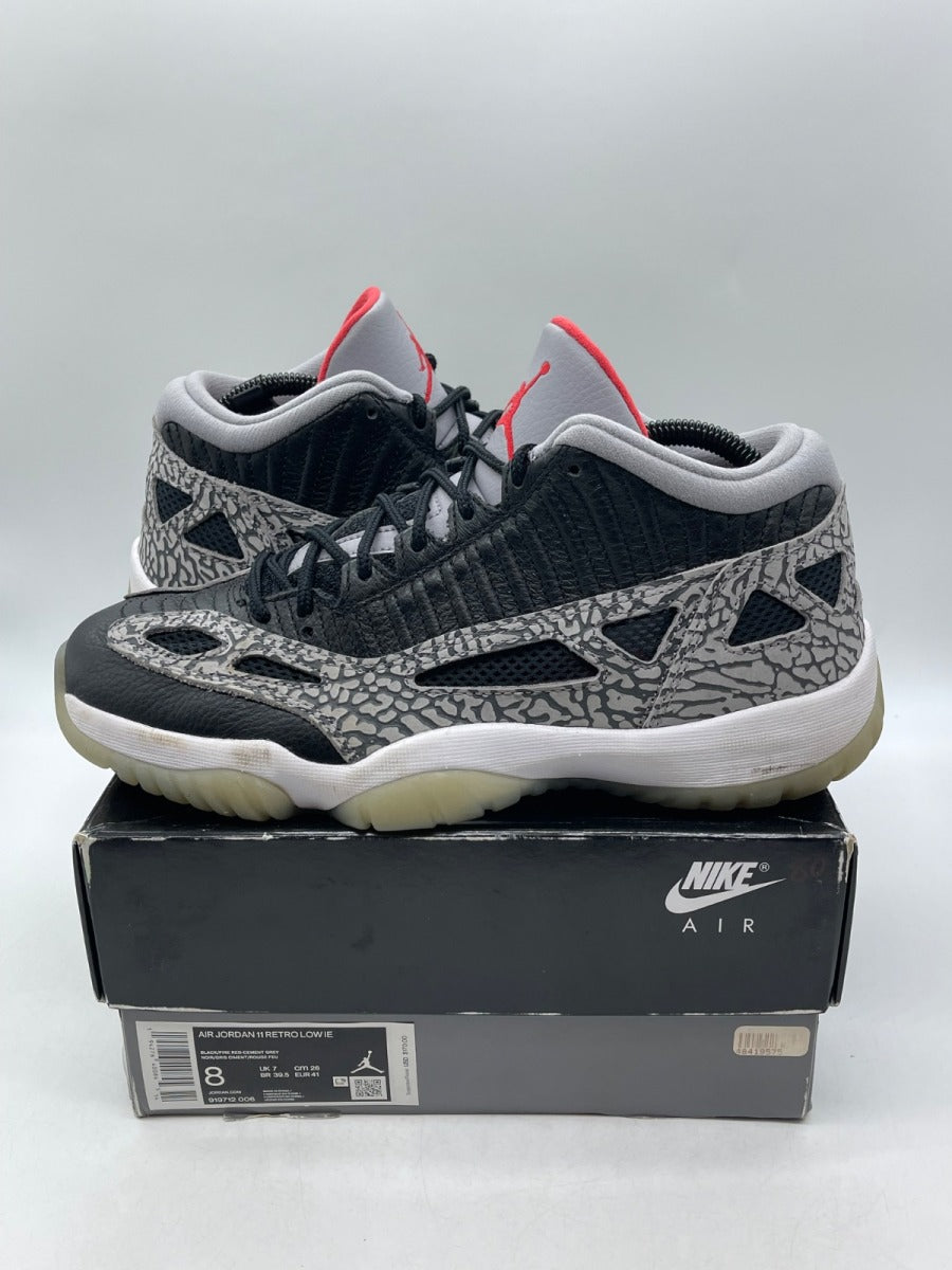 Jordan 11 Retro Low IE Black Cement 8 (Moderately Worn Pre-Owned) - Image 1