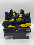 Jordan 4 Retro Thunder (2023) 9.5 (Moderately Worn Pre-Owned)JordanBlack/Tour Yellow - Image 1