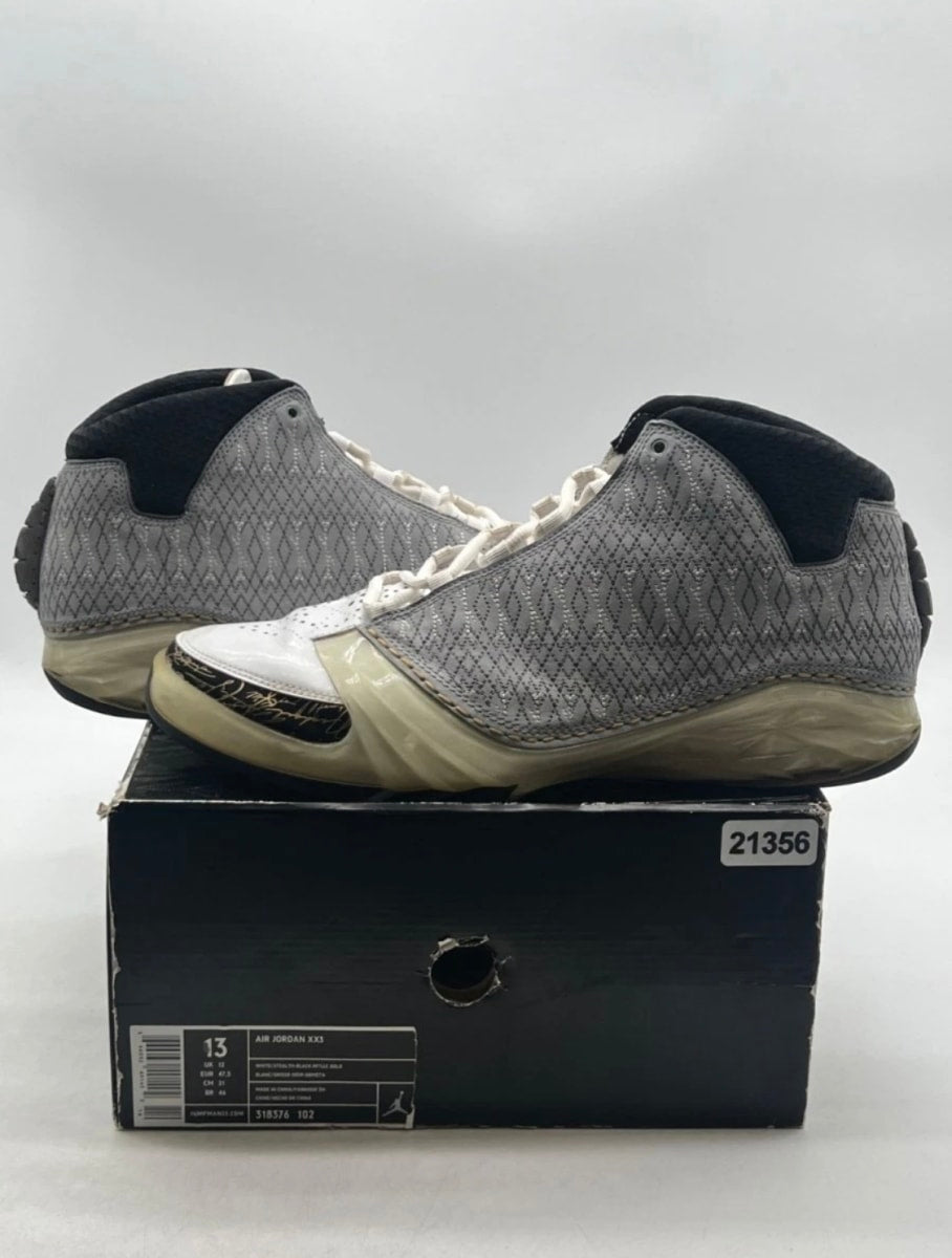 Jordan 23 White Stealth 13 (Heavily Worn Pre-Owned)JordanWhite/Stealth-Black-Metallic Gold - Image 1