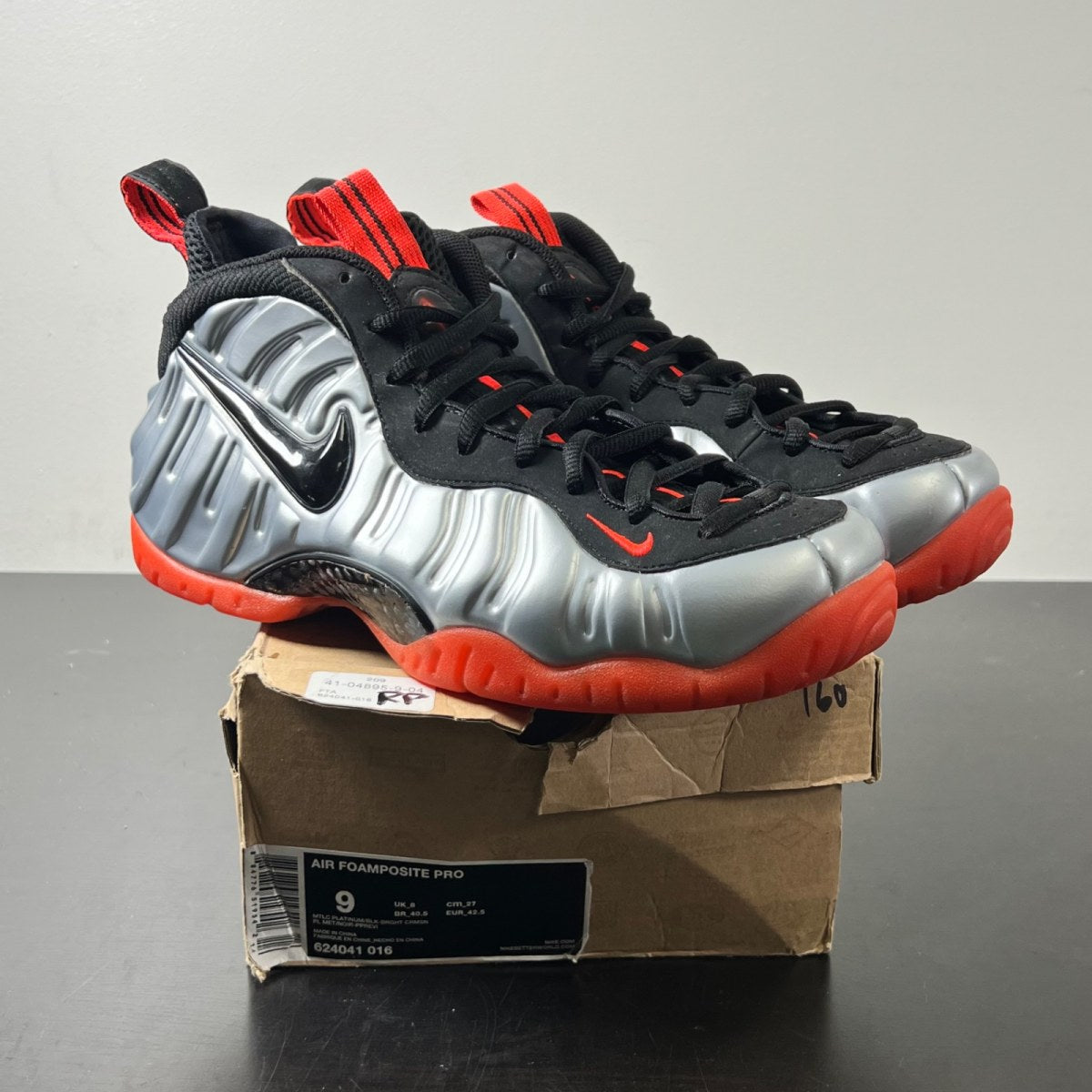 Nike Air Foamposite Pro Bright Crimson 9 (Lightly Worn Pre-Owned)NikeMetallic Silver/Black-Bright Crimson - Image 1