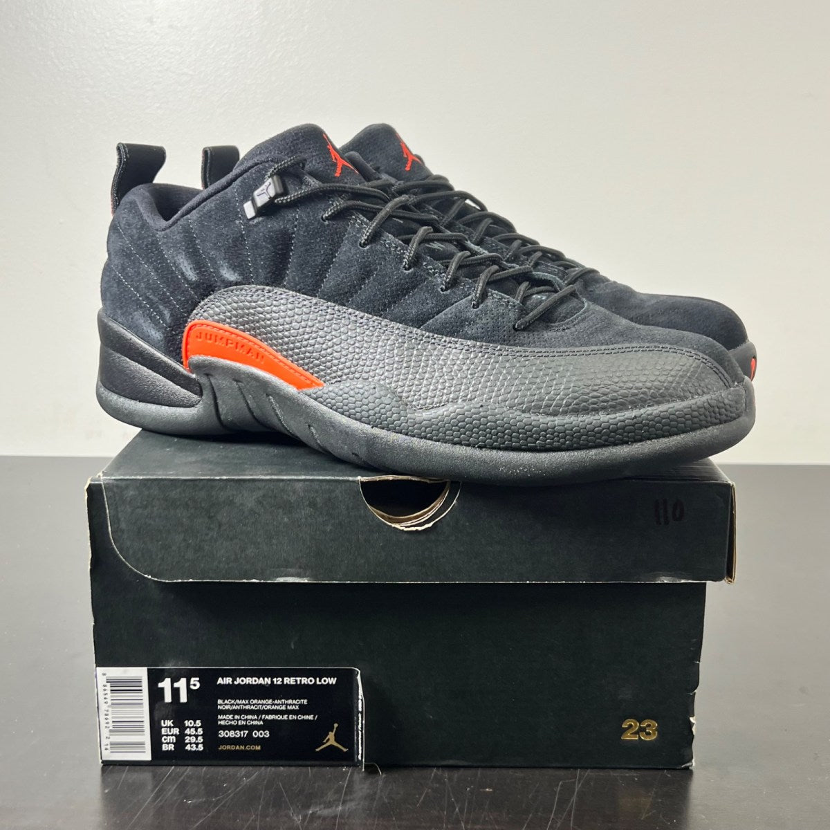 Jordan 12 Retro Low Max Orange 11.5 (Lightly Worn Pre-Owned)JordanBlack/Max Orange-Anthracite-Metallic Silver - Image 1