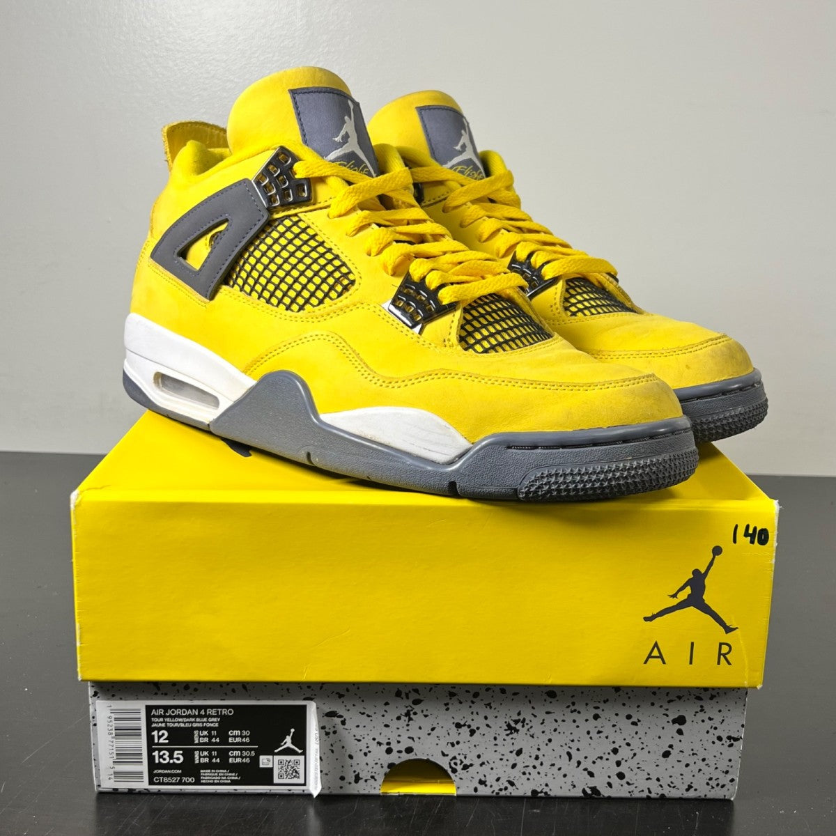 Jordan 4 Retro Lightning (2021) 12 (Moderately Worn Pre-Owned)JordanTour Yellow/White-Dark Blue Grey - Image 1