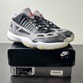 Jordan 11 Retro Low IE Black Cement 10.5 (Lightly Worn Pre-Owned)JordanBlack/Fire Red-Cement Grey-White - Image 1