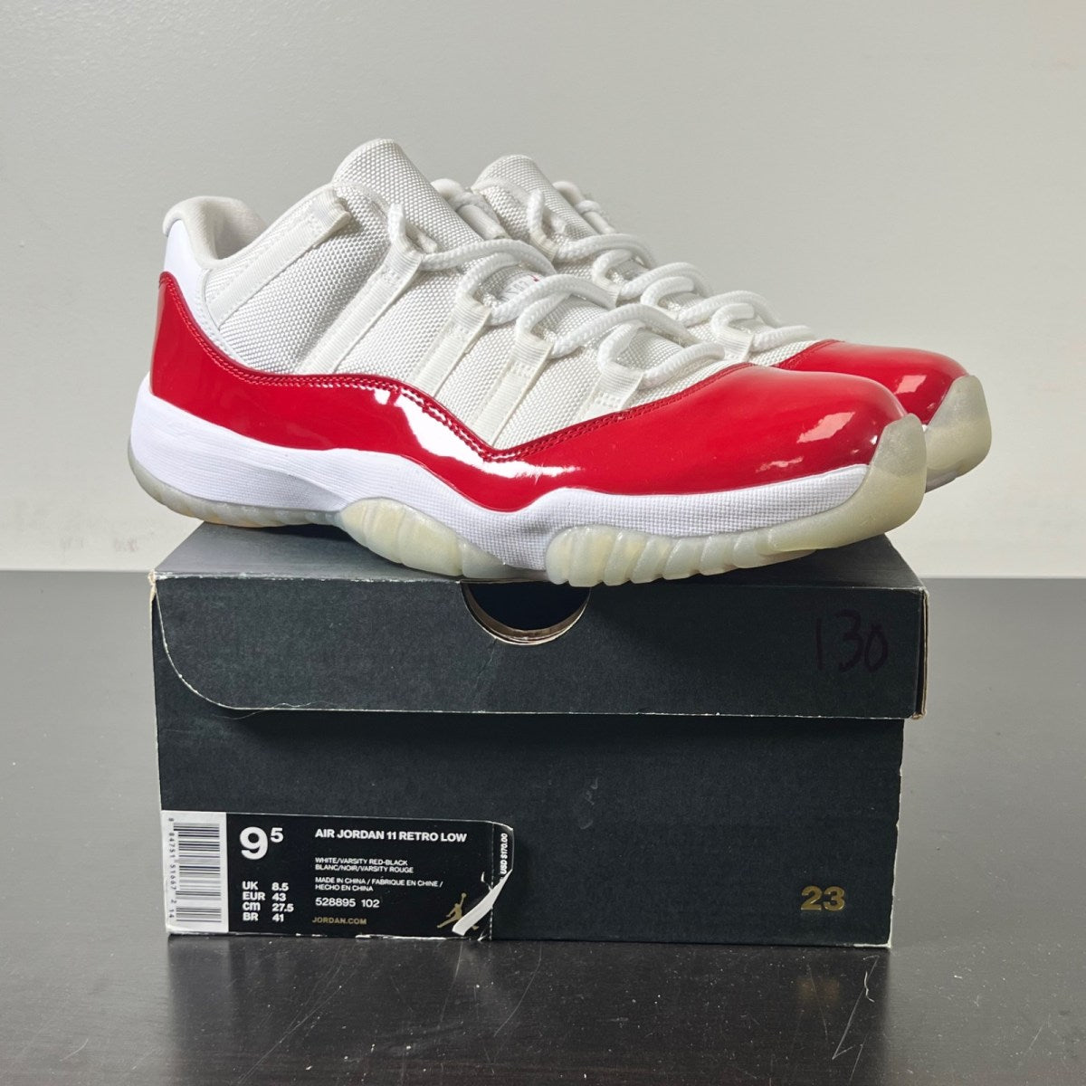 Jordan 11 Retro Low Cherry (2016) 9.5 (Lightly Worn Pre-Owned)JordanWhite/Varsity Red-Black - Image 1