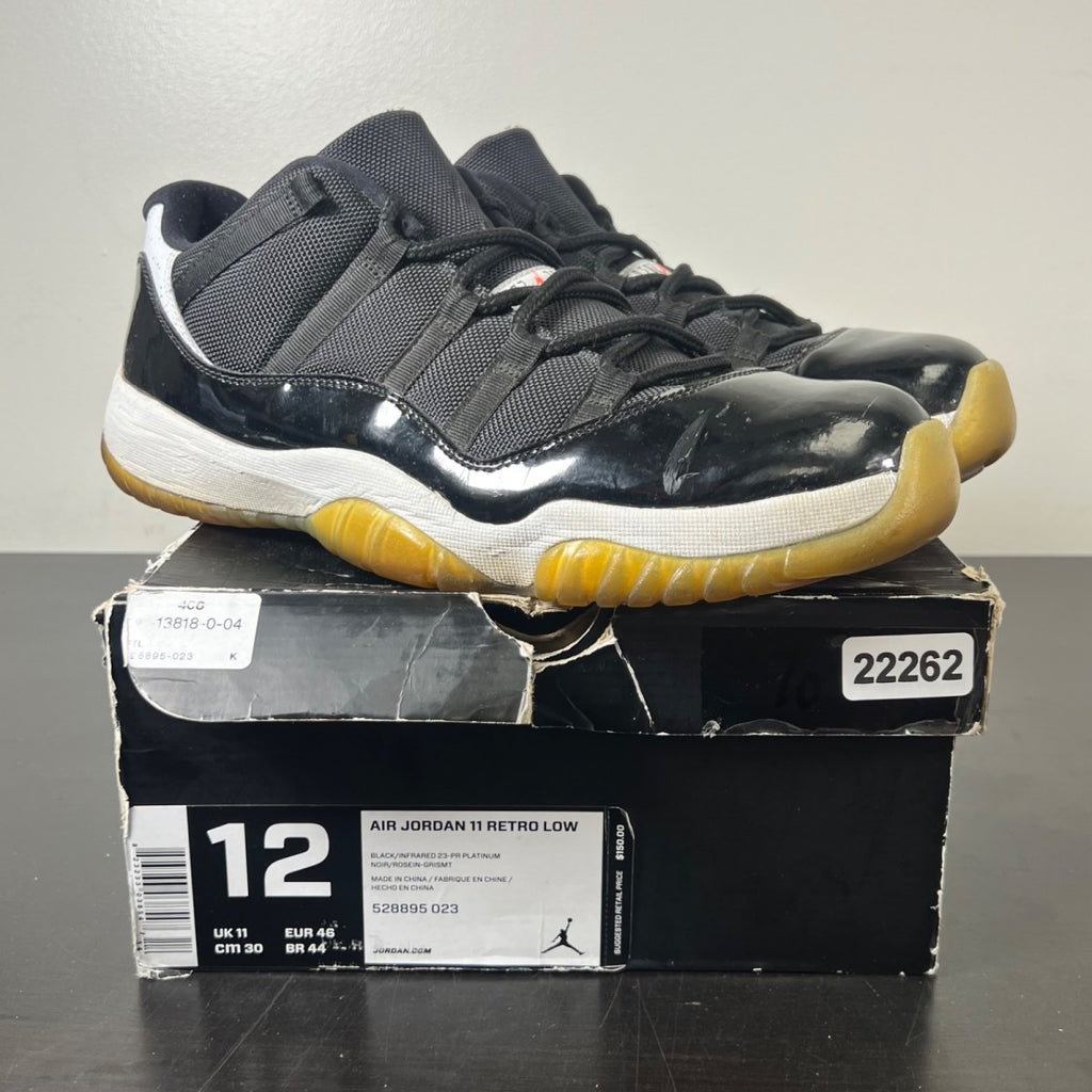 Jordan 11 Retro Low Infrared 12 (Heavily Worn Pre-Owned)JordanBlack/Infrared 23-Pure Platinum - Image 1