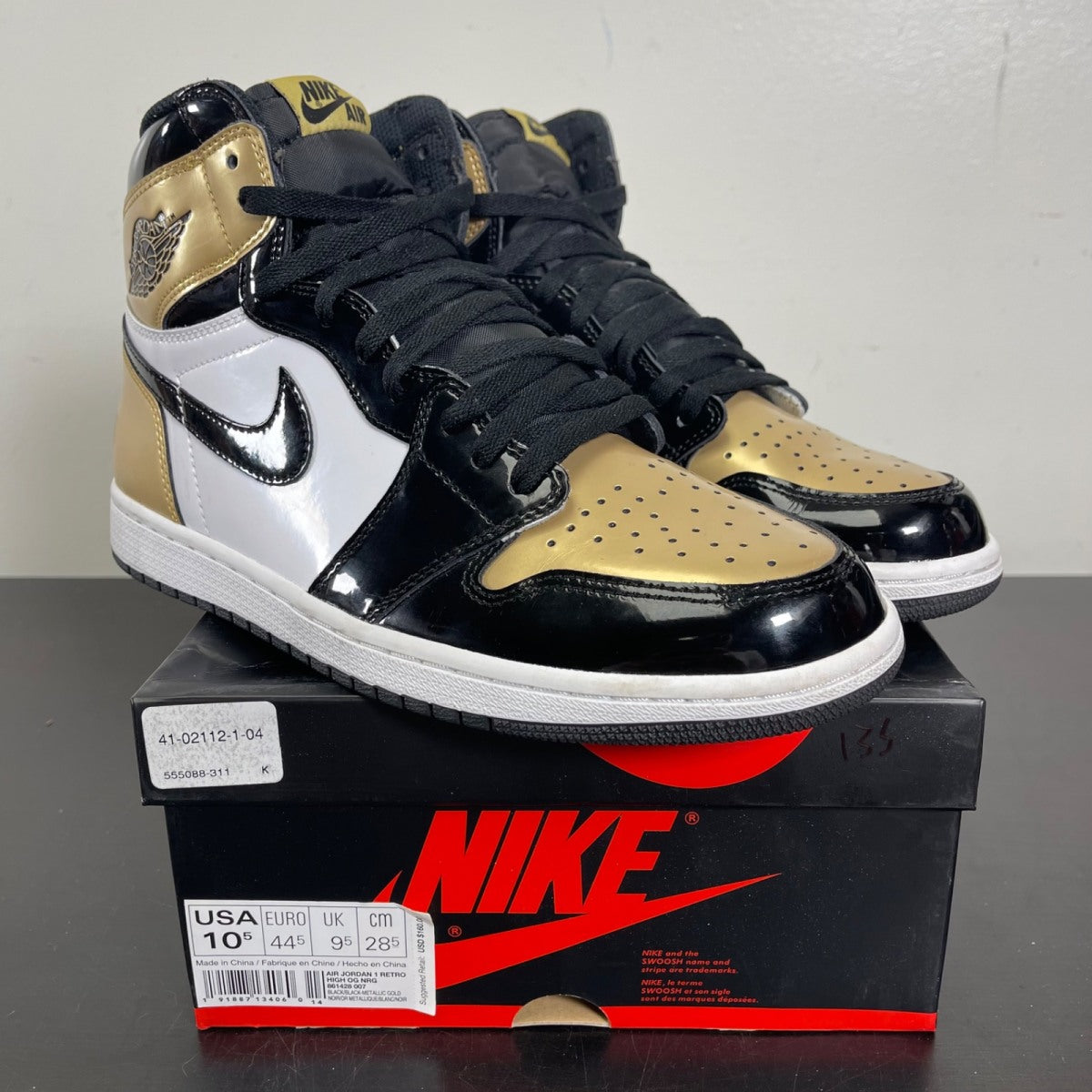 Jordan 1 Retro High NRG Patent Gold Toe 10.5 (Moderately Worn Pre-Owned)JordanBlack/Metallic Gold-Summit White - Image 1