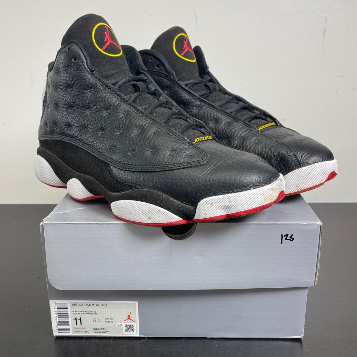 Jordan 13 Retro Playoffs (2023) 11 (Moderately Worn Pre-Owned)JordanBlack/Varsity Red-White-Vibrant Yellow - Image 1