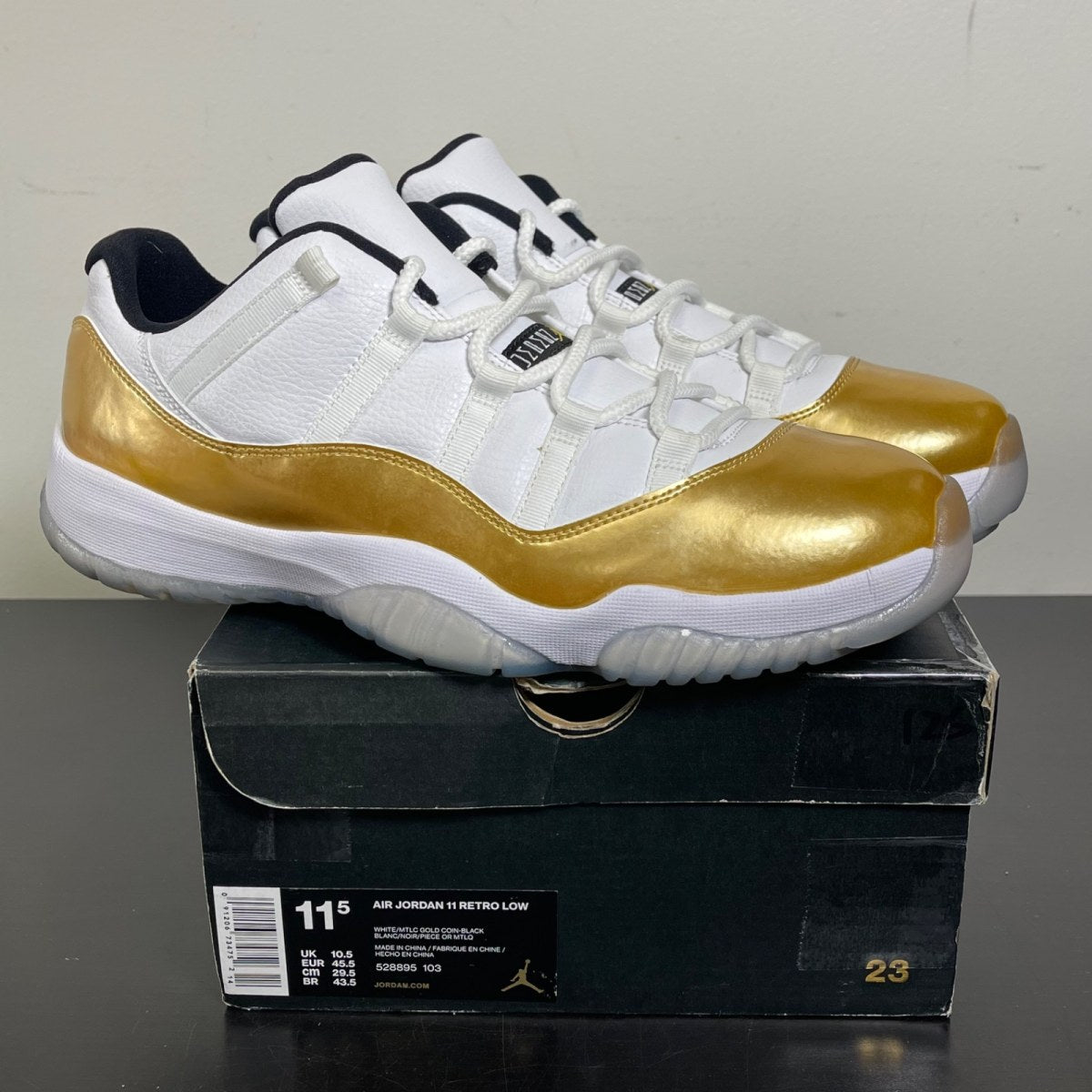 Jordan 11 Retro Low Closing Ceremony 11.5 (Moderately Worn Pre-Owned)JordanWhite/Metallic Gold Coin-Black - Image 1