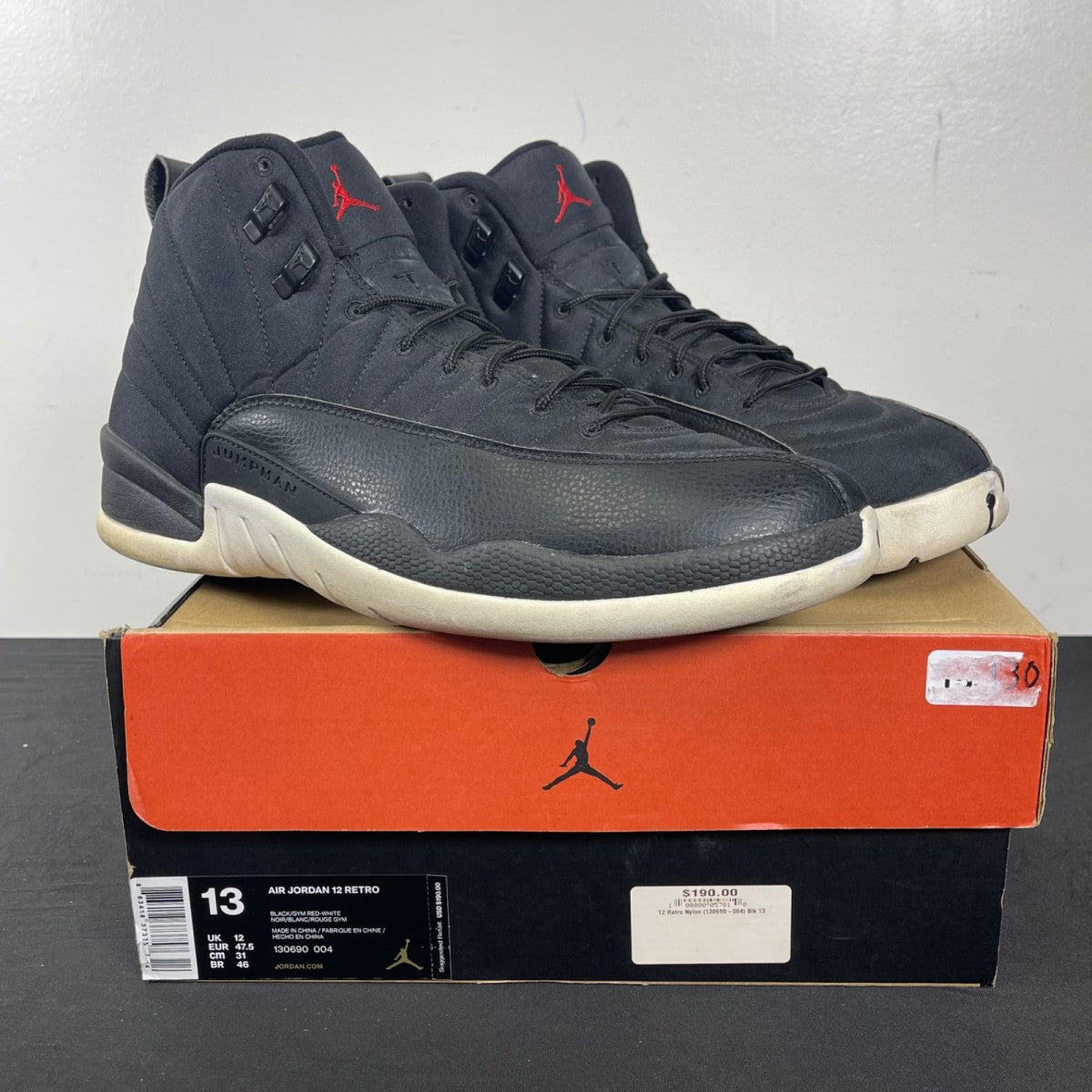 Jordan 12 Retro Nylon 13 (Moderately Worn Pre-Owned)JordanBlack/Gym Red-White - Image 1