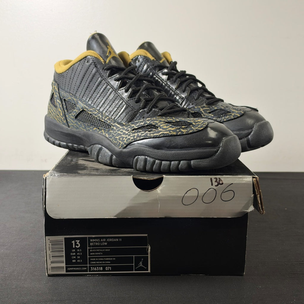 Jordan 11 Retro Low IE Black Metallic Gold (Women's) (Size 13W) - Image 1