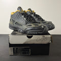 Jordan 11 Retro Low IE Black Metallic Gold (Women's) (Size 13W) - Image 1