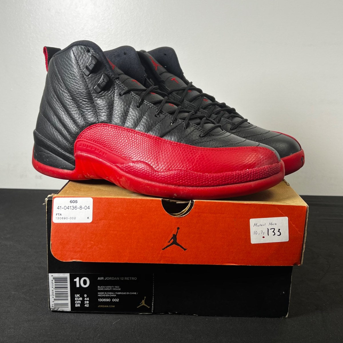 Jordan 12 Retro Flu Game (2016) 10 (Lightly Worn Pre-Owned)JordanBlack/Varsity Red - Image 1