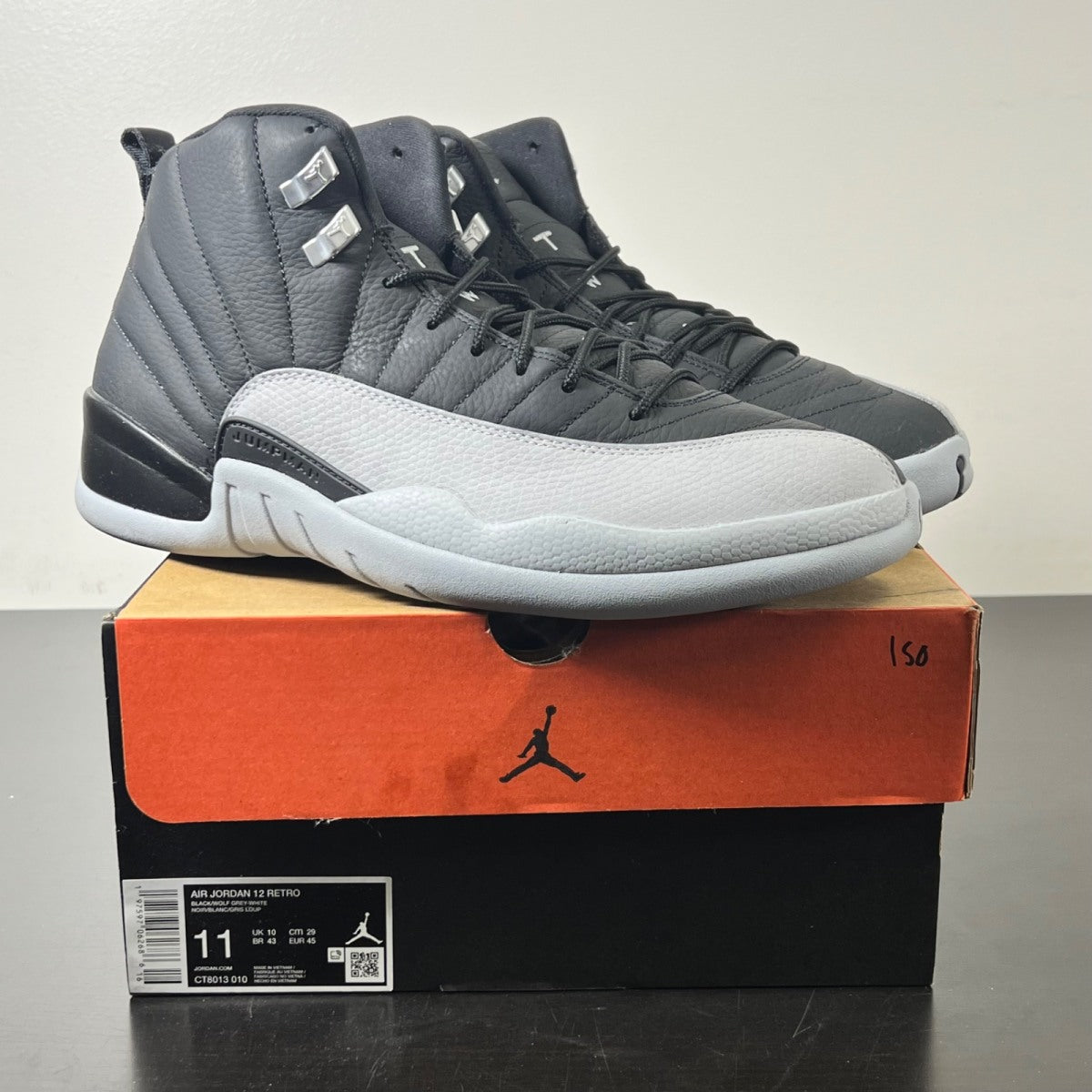 Jordan 12 Retro Barons 11 (Lightly Worn Pre-Owned)JordanBlack/Wolf Grey-White - Image 1