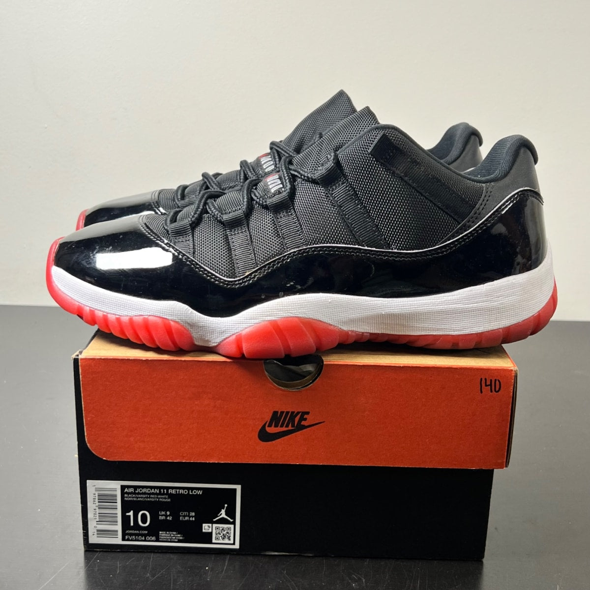 Jordan 11 Retro Low Bred (2025) 10 (Lightly Worn Pre-Owned)JordanBlack/White-Varsity Red - Image 3