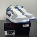 Jordan 1 Low SE True Blue 10 (Moderately Worn Pre-Owned)JordanWhite/Grey-True Blue-Black - Image 1