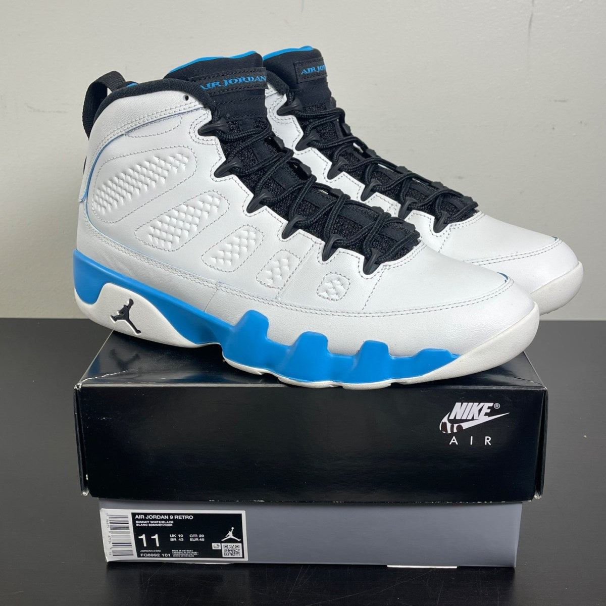 Jordan 9 Retro Powder Blue (2024) 11 (Moderately Worn Pre-Owned)JordanSummit White/Black/Dark Powder Blue - Image 1