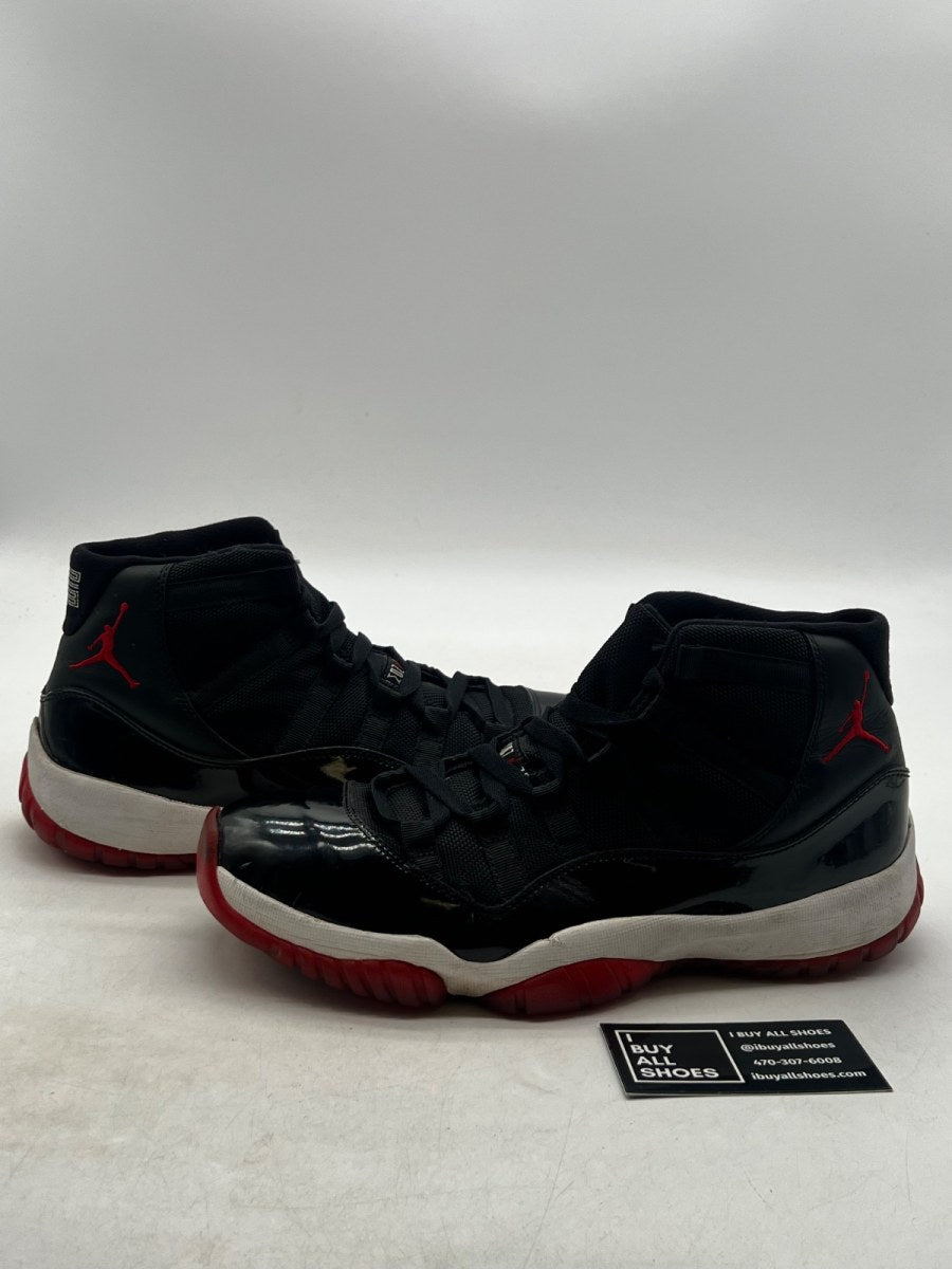 Jordan 11 Retro Playoffs (2012) 8.5 (Heavily Worn Pre-Owned) - Image 1