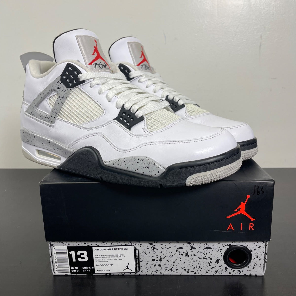 Jordan 4 Retro White Cement (2016) 13 (Moderately Worn Pre-Owned)JordanWhite/Fire Red-Black-Tech Grey - Image 1