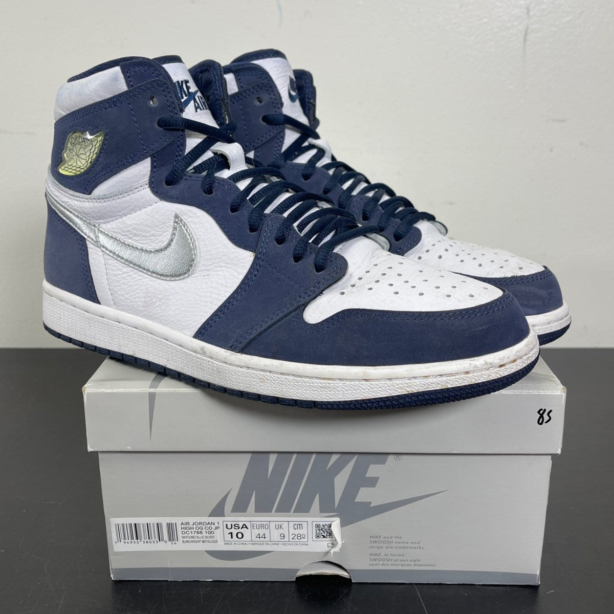 Jordan 1 Retro High CO.JP Midnight Navy (2020) 10 (Moderately Worn Pre-Owned)JordanWhite/Metallic Silver-Midnight Navy - Image 1
