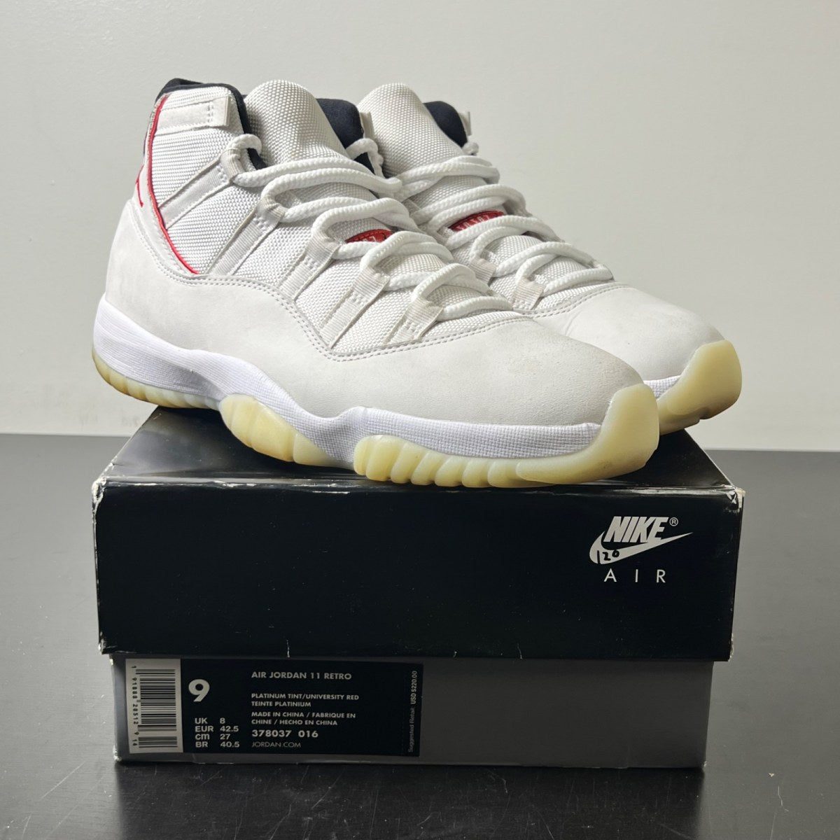 Jordan 11 Retro Platinum Tint 9 (Lightly Worn Pre-Owned)JordanPlatinum Tint/Sail-University Red-Black - Image 1