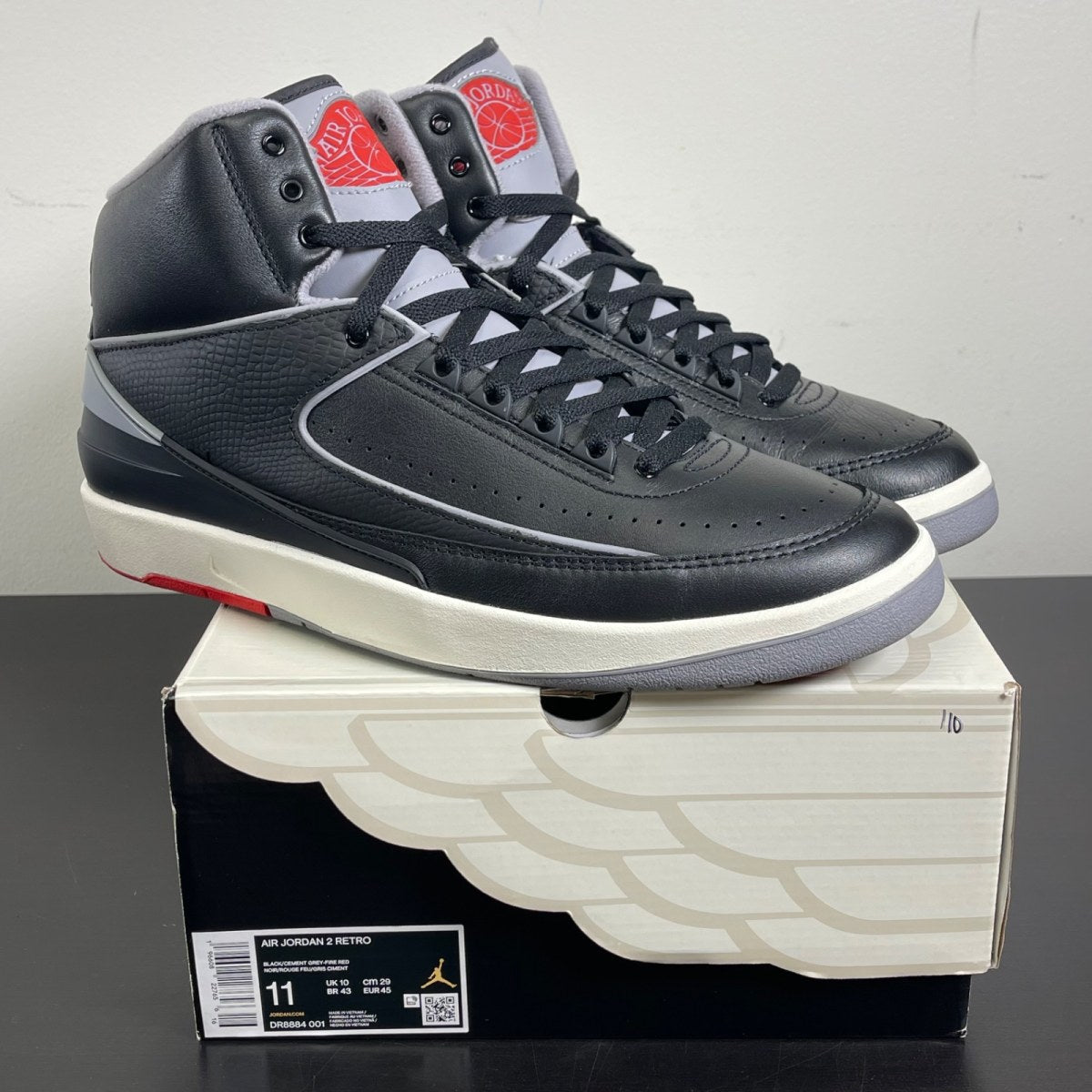 Jordan 2 Retro Black Cement 11 (Moderately Worn Pre-Owned)JordanBlack/Cement Grey/Fire Red/Sail - Image 1