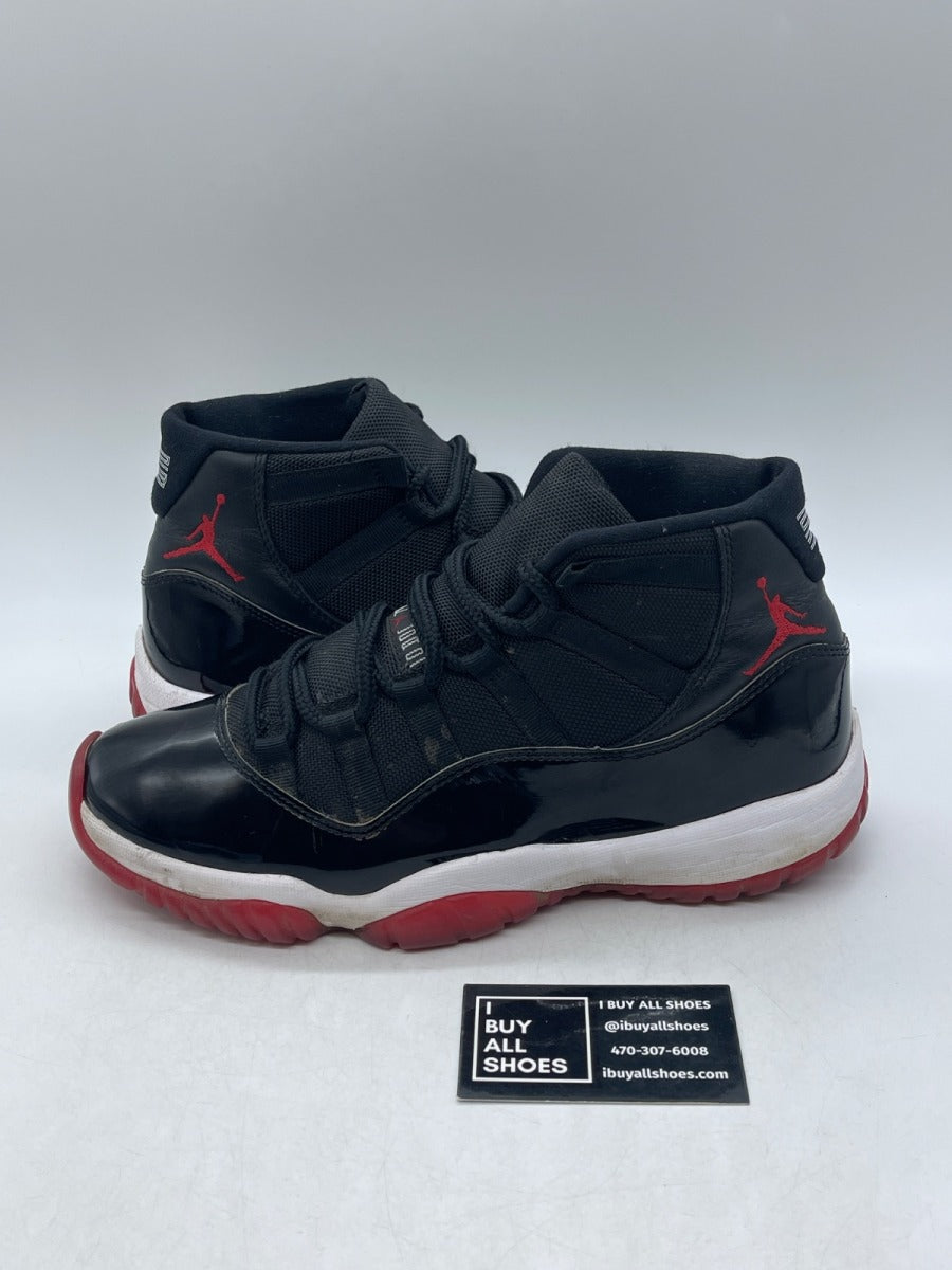 Jordan 11 Retro Playoffs Bred (2019) 9.5 (Heavily Worn Pre-Owned) - Image 1