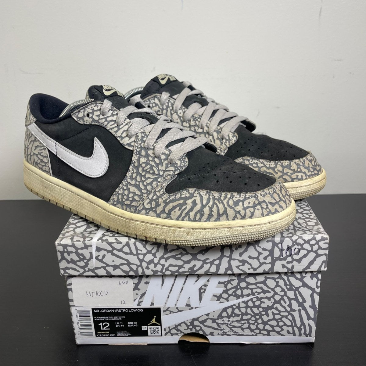 Jordan 1 Retro Low OG Black Cement 12 (Moderately Worn Pre-Owned)JordanBlack/Muslin/Tech Grey/White/Sail - Image 1