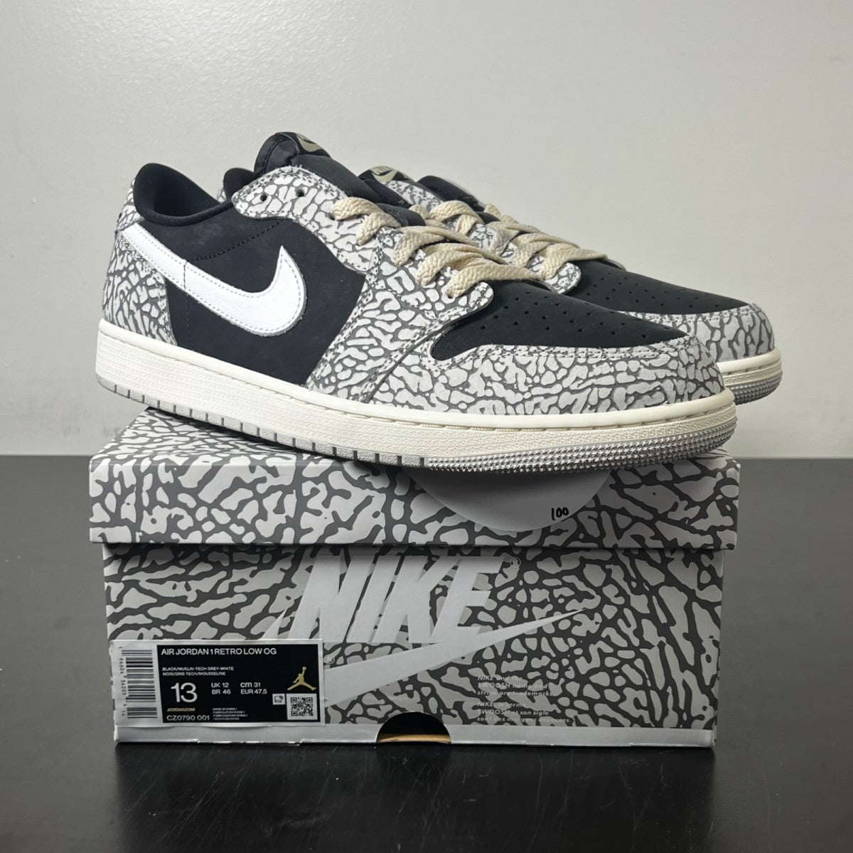 Jordan 1 Retro Low OG Black Cement 13 (Lightly Worn Pre-Owned)JordanBlack/Muslin/Tech Grey/White/Sail - Image 1
