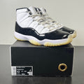 Jordan 11 Retro DMP Gratitude (2023) 10 (Moderately Worn Pre-Owned)JordanBlack/White/Metallic Gold - Image 1