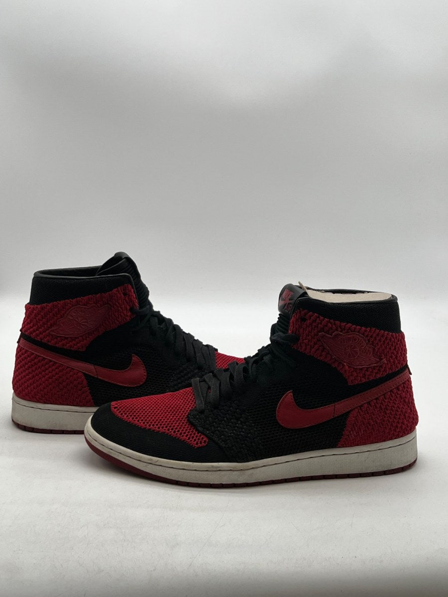 Jordan 1 Retro High Flyknit Bred 12 (Moderately Worn Pre-Owned)JordanBlack/Varsity Red-White - Image 1